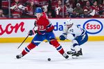 Apr 26, 2026; Montreal, Quebec, CAN; Montreal Canadiens right wing Ivan Demidov (93) plays the puck against Tampa Bay Lightning center Anthony Cirelli (71) during the third period in game four of the first round of the 2026 Stanley Cup Playoffs at Bell Centre. Mandatory Credit: David Kirouac-Imagn Images