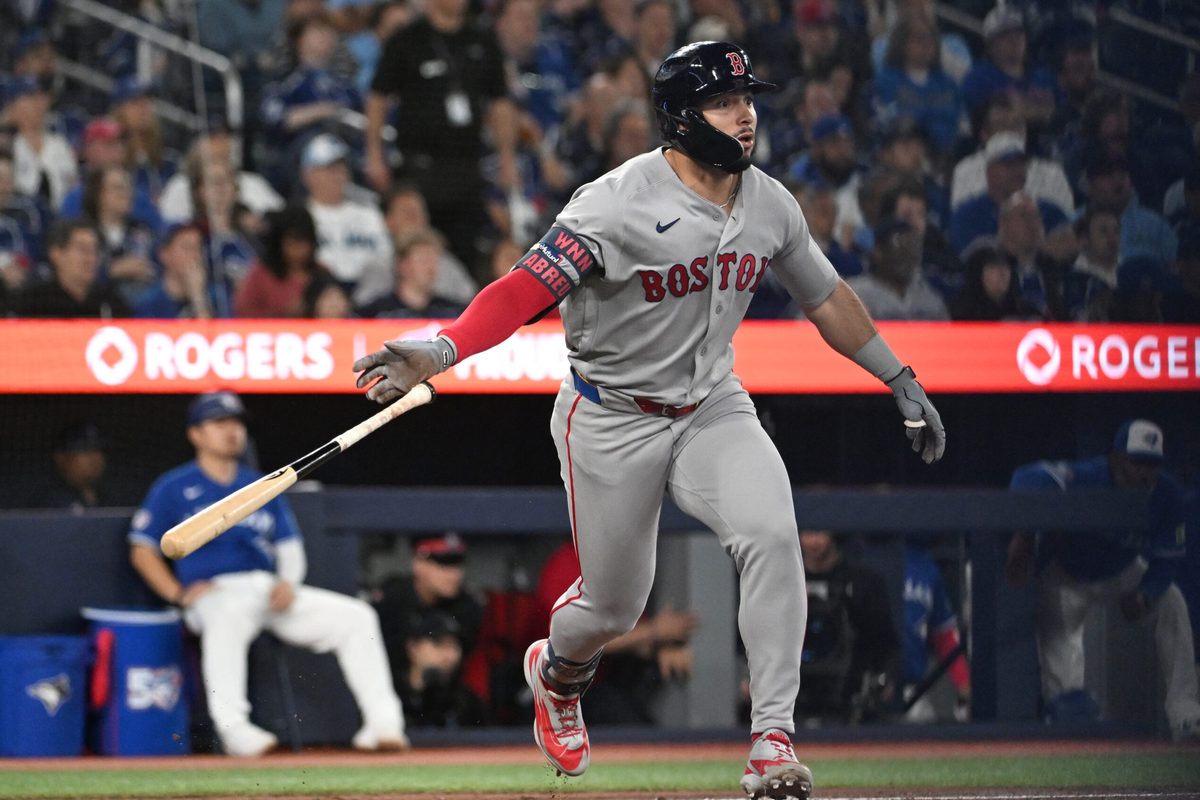 Apr 27, 2026; Toronto, Ontario, CAN;  Boston Red Sox  right fielder Wilyer Abreu (52) hits an RBI double against the Toronto Blue Jays in the fifth inning at Rogers Centre. Mandatory Credit: Dan Hamilton-Imagn Images