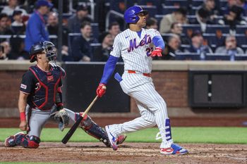 Apr 28, 2026; New York City, New York, USA;  New York Mets designated hitter Juan Soto (22) hits a two run home run in the fourth inning against the Washington Nationals at Citi Field. Mandatory Credit: Wendell Cruz-Imagn Images