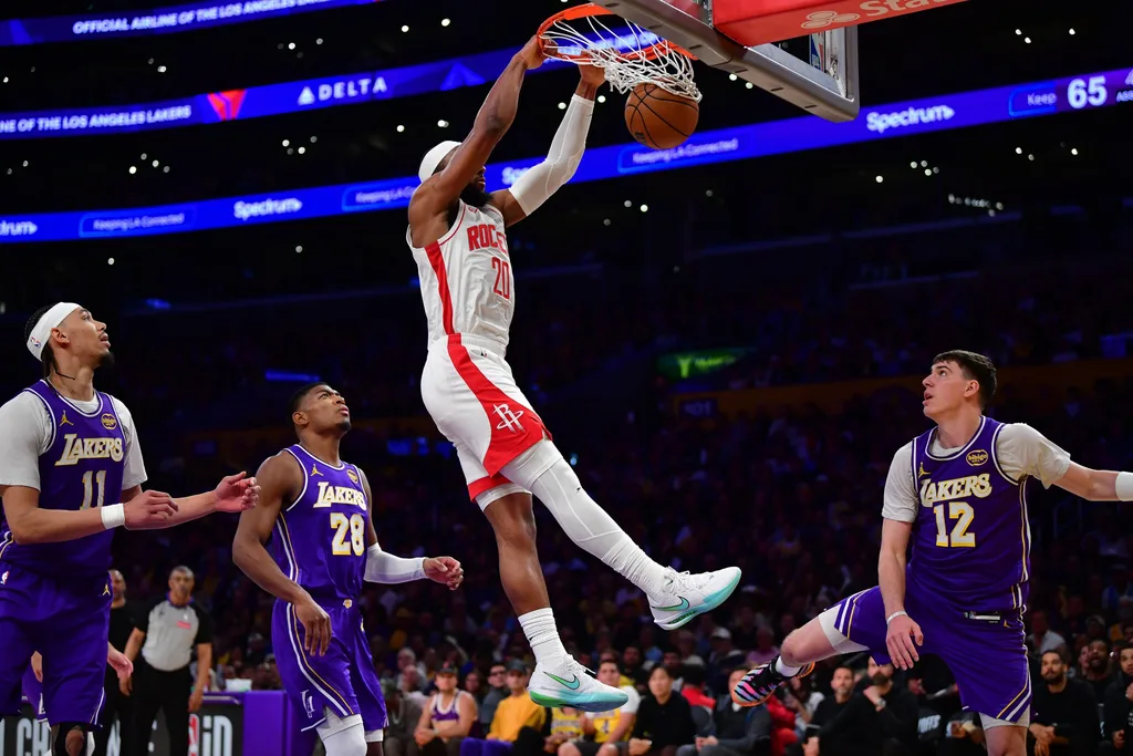 Apr 29, 2026; Los Angeles, California, USA; Houston Rockets guard Josh Okogie (20) dunks for the basket against the Los Angeles Lakers during the second half in game five of the first round of the 2026 NBA Playoffs at Crypto.com Arena. Mandatory Credit: Gary A. Vasquez-Imagn Images