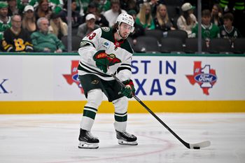 Apr 28, 2026; Dallas, Texas, USA; Minnesota Wild defenseman Quinn Hughes (43) skates against the Dallas Stars in game five of the first round of the 2026 Stanley Cup Playoffs at American Airlines Center. Mandatory Credit: Jerome Miron-Imagn Images