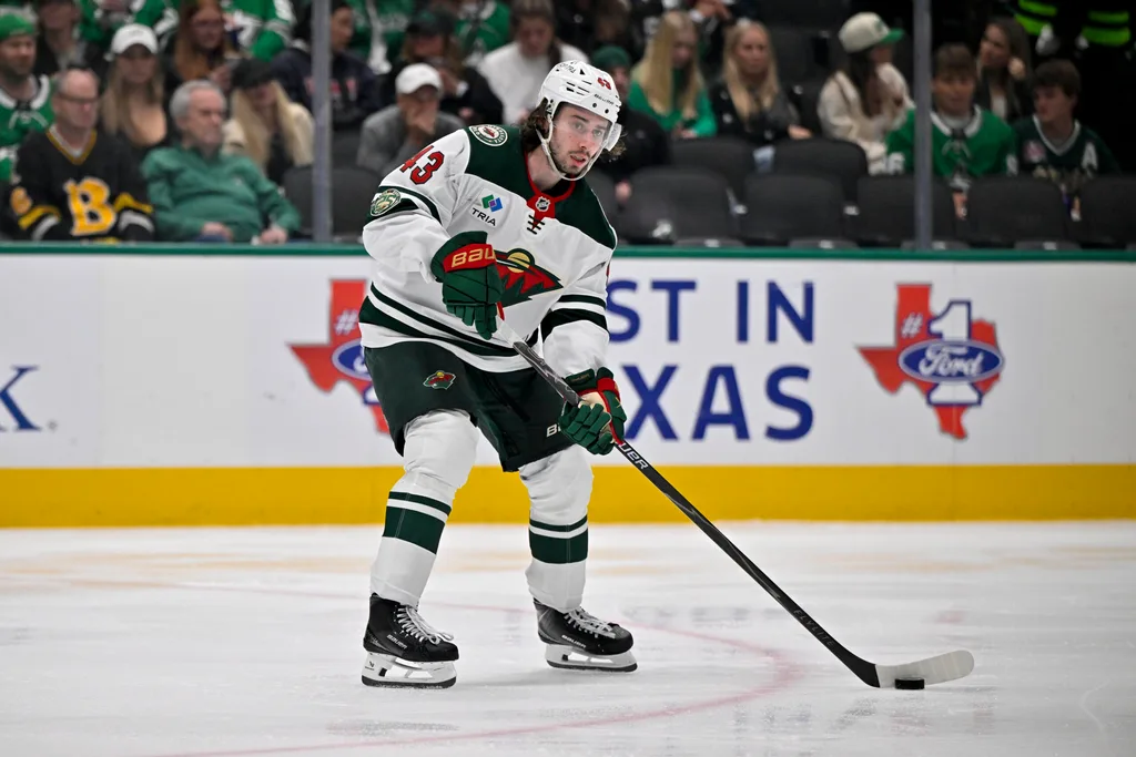 Apr 28, 2026; Dallas, Texas, USA; Minnesota Wild defenseman Quinn Hughes (43) skates against the Dallas Stars in game five of the first round of the 2026 Stanley Cup Playoffs at American Airlines Center. Mandatory Credit: Jerome Miron-Imagn Images