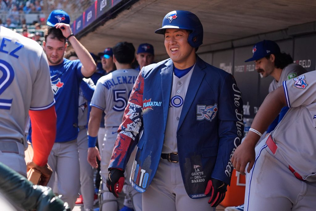 May 2, 2026; Minneapolis, Minnesota, USA; Toronto Blue Jays third baseman Kazuma Okamoto (7) celebrates his solo home run against the Minnesota Twins in the sixth inning at Target Field. Mandatory Credit: Bruce Kluckhohn-Imagn Images