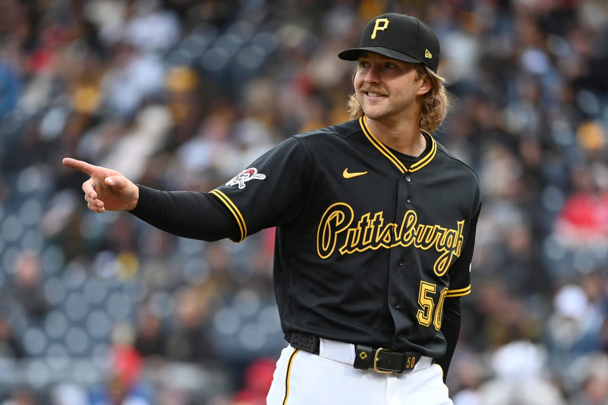 May 2, 2026; Pittsburgh, Pennsylvania, USA; Pittsburgh Pirates starting pitcher Carmen Mlodzinski gestures to center fielder Oneil Cruz after making a catch against the Cincinnati Reds to end the fourth inning at PNC Park. Mandatory Credit: Philip G. Pavely-Imagn Images