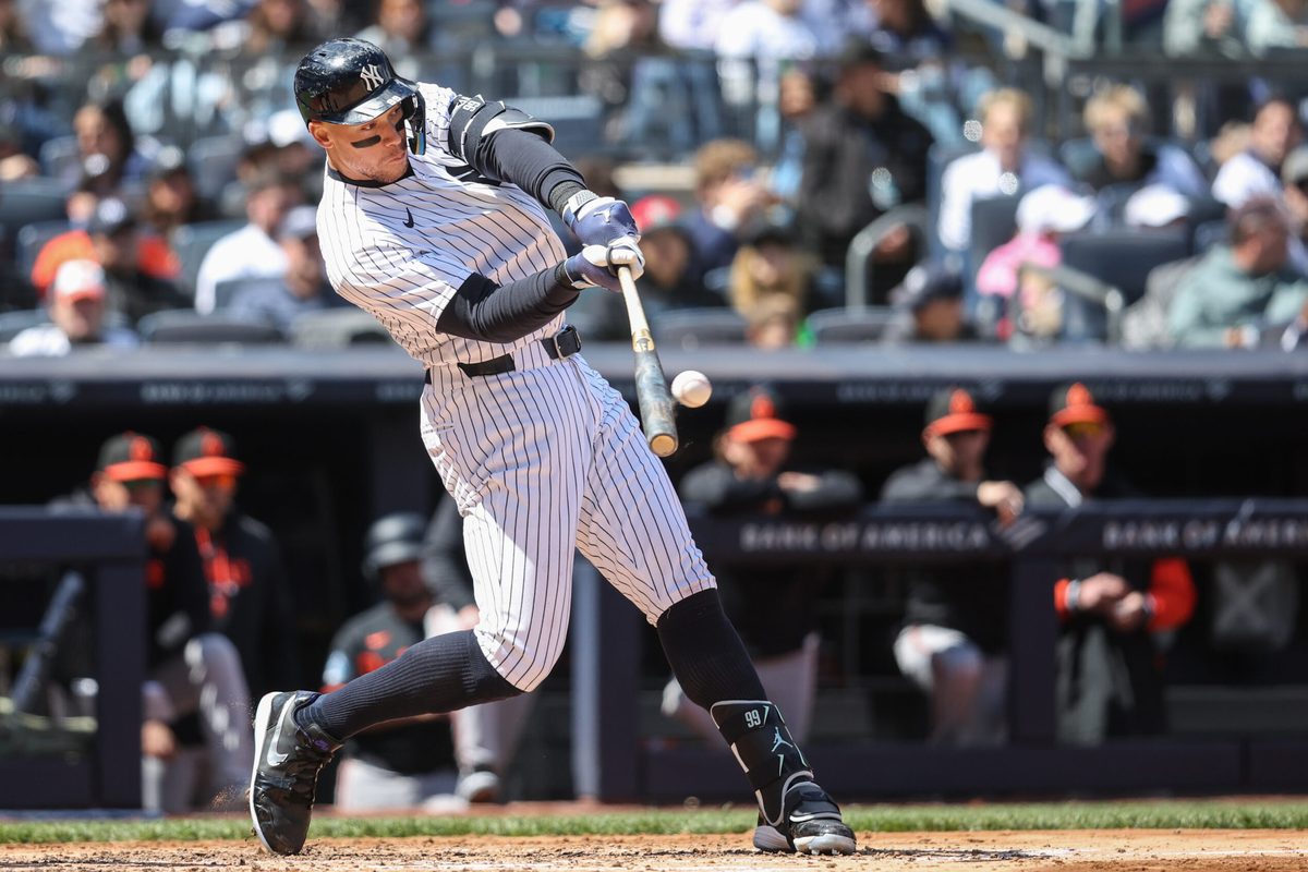 May 3, 2026; Bronx, New York, USA;  New York Yankees right fielder Aaron Judge (99) hits a two run home run in the third inning against the Baltimore Orioles at Yankee Stadium. Mandatory Credit: Wendell Cruz-Imagn Images