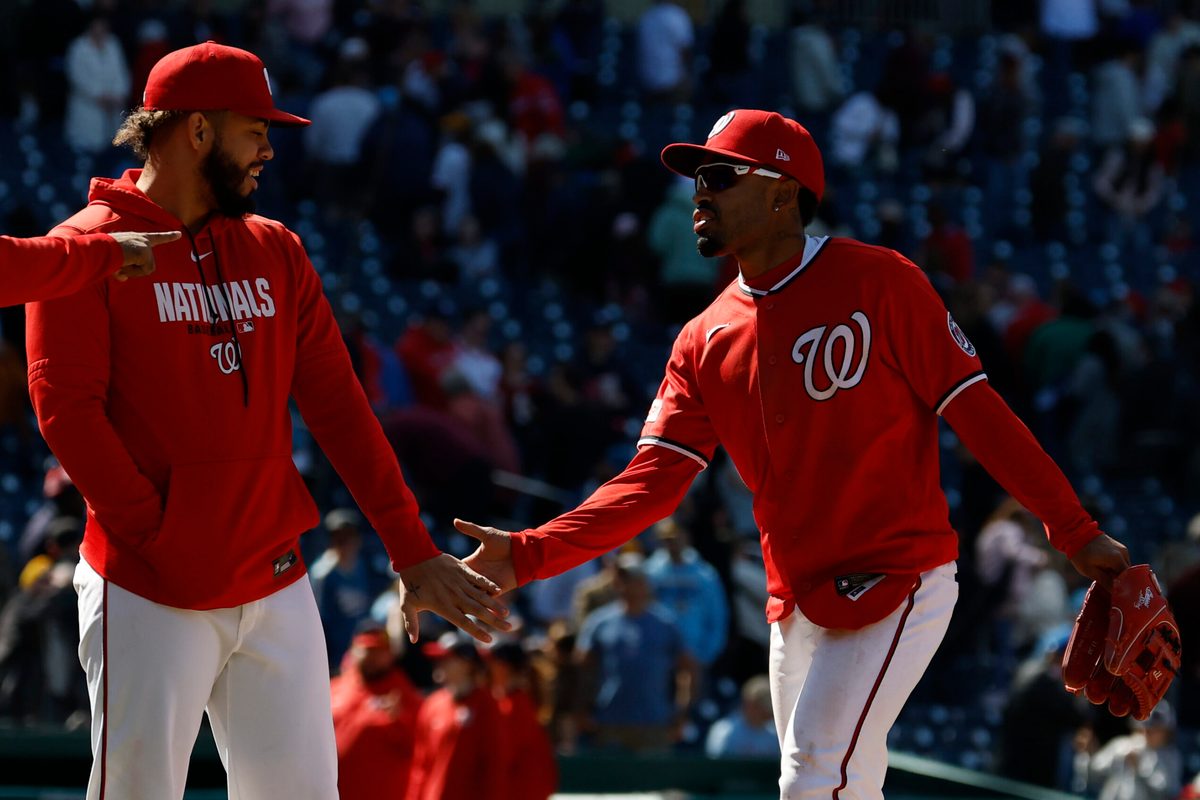 May 3, 2026; Washington, District of Columbia, USA; Washington Nationals second baseman Nasim Nuñez (R) celebrates with Nationals second baseman Luis García Jr. (L) after their game against the Milwaukee Brewers at Nationals Park. Mandatory Credit: Geoff Burke-Imagn Images