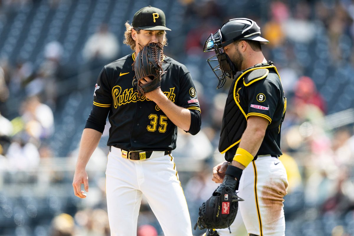 May 3, 2026; Pittsburgh, Pennsylvania, USA;  Pittsburgh Pirates starting pitcher Braxton Ashcraft (35) talks with catcher Joey Bart (14) during the seventh inning at PNC Park. Mandatory Credit: Scott Galvin-Imagn Images