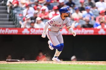 May 3, 2026; Anaheim, California, USA; New York Mets shortstop Bo Bichette (19) runs after hitting a single during the seventh inning against the Los Angeles Angels at Angel Stadium. Mandatory Credit: William Liang-Imagn Images