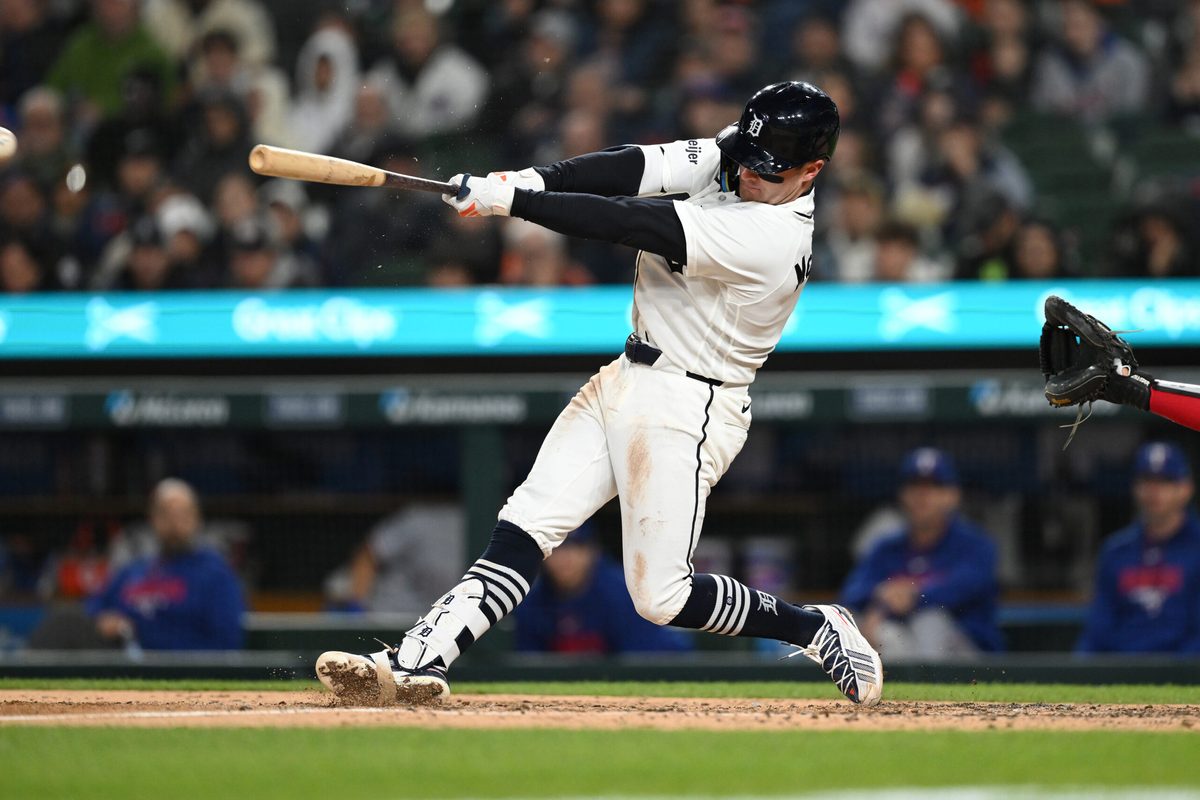 May 3, 2026; Detroit, Michigan, USA;  Detroit Tigers shortstop Kevin McGonigle (7) hits a RBI single against the Texas Rangers in the sixth inning at Comerica Park. Mandatory Credit: Lon Horwedel-Imagn Images