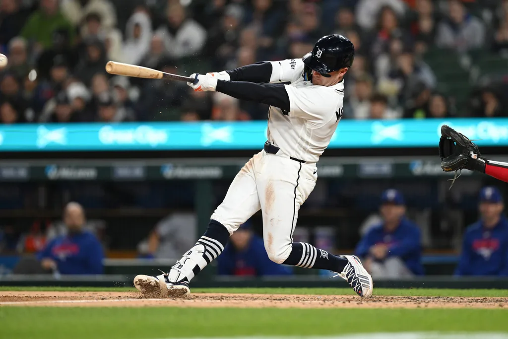 May 3, 2026; Detroit, Michigan, USA; Detroit Tigers shortstop Kevin McGonigle (7) hits a RBI single against the Texas Rangers in the sixth inning at Comerica Park. Mandatory Credit: Lon Horwedel-Imagn Images