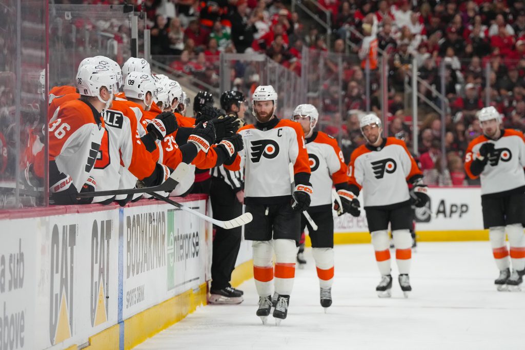 May 4, 2026; Raleigh, North Carolina, USA; Philadelphia Flyers center Sean Couturier (14) celebrates his goal against the Carolina Hurricanes during the first period in game two of the second round of the 2026 Stanley Cup Playoffs at Lenovo Center. Mandatory Credit: James Guillory-Imagn Images