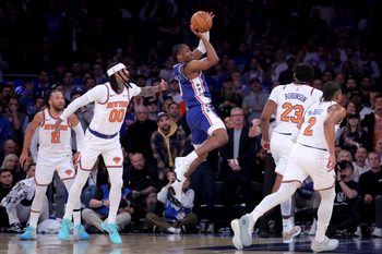 May 4, 2026; New York, New York, USA; Philadelphia 76ers guard Tyrese Maxey (0) looks to pass the ball against New York Knicks guards Jalen Brunson (11) and Jordan Clarkson (00) and center Mitchell Robinson (23) and guard Miles McBride (2) during the first quarter of game one of the eastern conference semifinal round of the 2026 NBA Playoffs at Madison Square Garden. Mandatory Credit: Brad Penner-Imagn Images