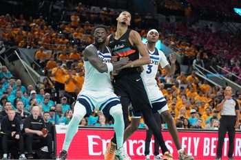 May 4, 2026; San Antonio, Texas, USA; Minnesota Timberwolves forwards Julius Randle (30) and Jaden McDaniels (3) try to keep San Antonio Spurs forward Victor Wembanyama (1) back in the second half during game one of the second round of the 2026 NBA Playoffs at Frost Bank Center. Mandatory Credit: Daniel Dunn-Imagn Images