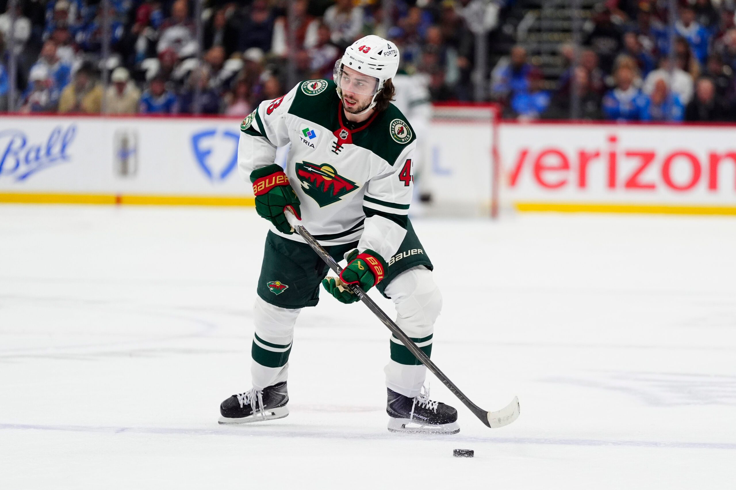 May 5, 2026; Denver, Colorado, USA; Minnesota Wild defenseman Quinn Hughes (43) prepares to shoot the puck against the Colorado Avalanche in game two of the second round of the 2026 Stanely Cup Playoffs at Ball Arena. Mandatory Credit: Ron Chenoy-Imagn Images