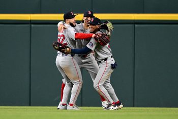 May 5, 2026; Detroit, Michigan, USA; Boston Red Sox outfielders Wilyer Abreu (52), Jarren Duran (16) and Ceddanne Rafaela (3) celebrate their win over the Detroit Tigers at Comerica Park. Mandatory Credit: Lon Horwedel-Imagn Images