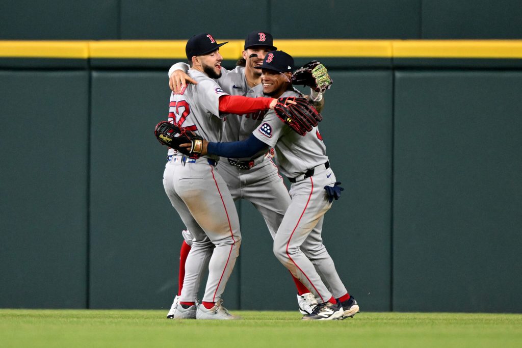 May 5, 2026; Detroit, Michigan, USA; Boston Red Sox outfielders Wilyer Abreu (52), Jarren Duran (16) and Ceddanne Rafaela (3) celebrate their win over the Detroit Tigers at Comerica Park. Mandatory Credit: Lon Horwedel-Imagn Images