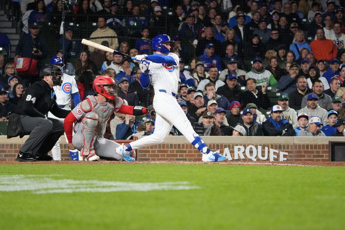 May 5, 2026; Chicago, Illinois, USA; Chicago Cubs center fielder Pete Crow-Armstrong (4) hits a single against the Cincinnati Reds during the seventh inning at Wrigley Field. Mandatory Credit: David Banks-Imagn Images