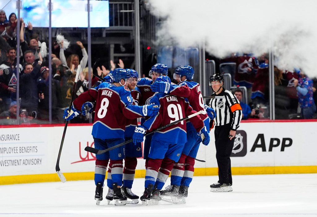 May 5, 2026; Denver, Colorado, USA; Colorado Avalanche center Nathan MacKinnon (29) celebrates his goal with teammates during the third period against the Minnesota Wild in game two of the second round of the 2026 Stanley Cup Playoffs at Ball Arena. Mandatory Credit: Ron Chenoy-Imagn Images