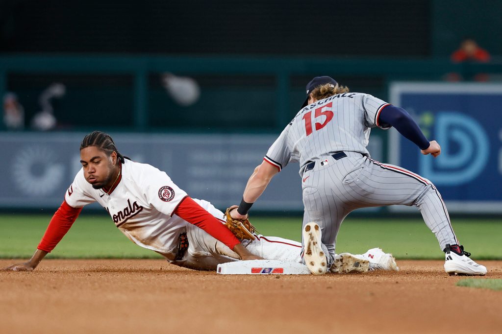 May 6, 2026; Washington, District of Columbia, USA; Washington Nationals right fielder James Wood (29) steals second base ahead of a tag by Minnesota Twins second baseman Luke Keaschall (15) during the fourth inning at Nationals Park. Mandatory Credit: Geoff Burke-Imagn Images
