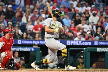 May 6, 2026; Philadelphia, Pennsylvania, USA; Athletics first baseman Nick Kurtz (16) hits an RBI single against the Philadelphia Phillies during the fifth inning at Citizens Bank Park. Mandatory Credit: Eric Hartline-Imagn Images