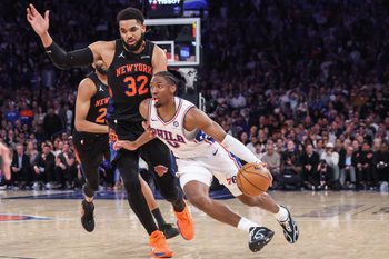 May 6, 2026; New York, New York, USA; Philadelphia 76ers guard Tyrese Maxey (0) drives past New York Knicks center Karl-Anthony Towns (32) during game five of the second round of the 2026 NBA Playoffs at Madison Square Garden. Mandatory Credit: Wendell Cruz-Imagn Images