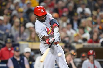 May 7, 2026; San Diego, California, USA; St. Louis Cardinals right fielder Jordan Walker (18) hits a double during the ninth inning against the San Diego Padres at Petco Park. Mandatory Credit: Denis Poroy-Imagn Images