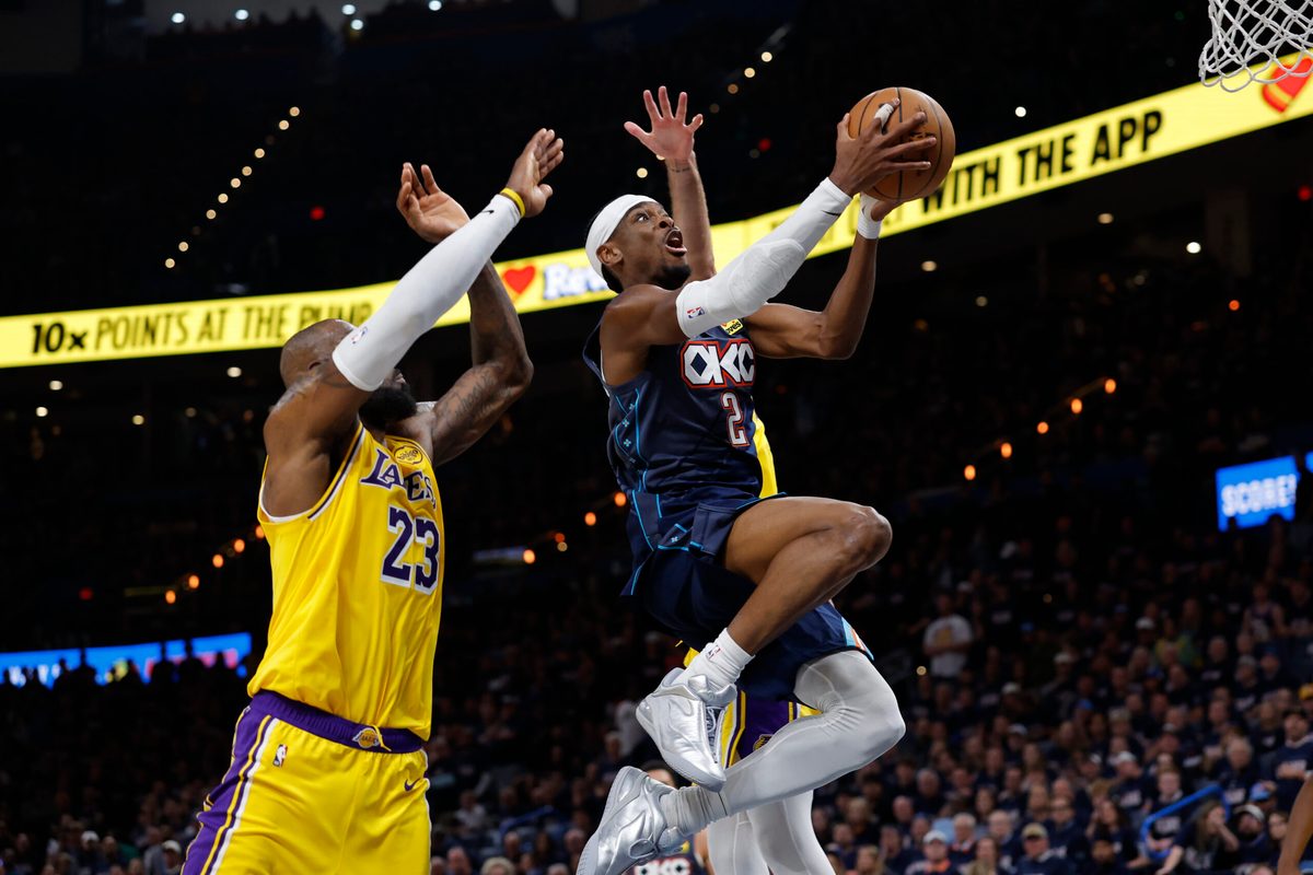 May 7, 2026; Oklahoma City, Oklahoma, USA; Oklahoma City Thunder guard Shai Gilgeous-Alexander (2) goes up for a basket in front of Los Angeles Lakers forward LeBron James (23) in the second half during game two of the second round of the 2026 NBA Playoffs at Paycom Center. Mandatory Credit: Alonzo Adams-Imagn Images