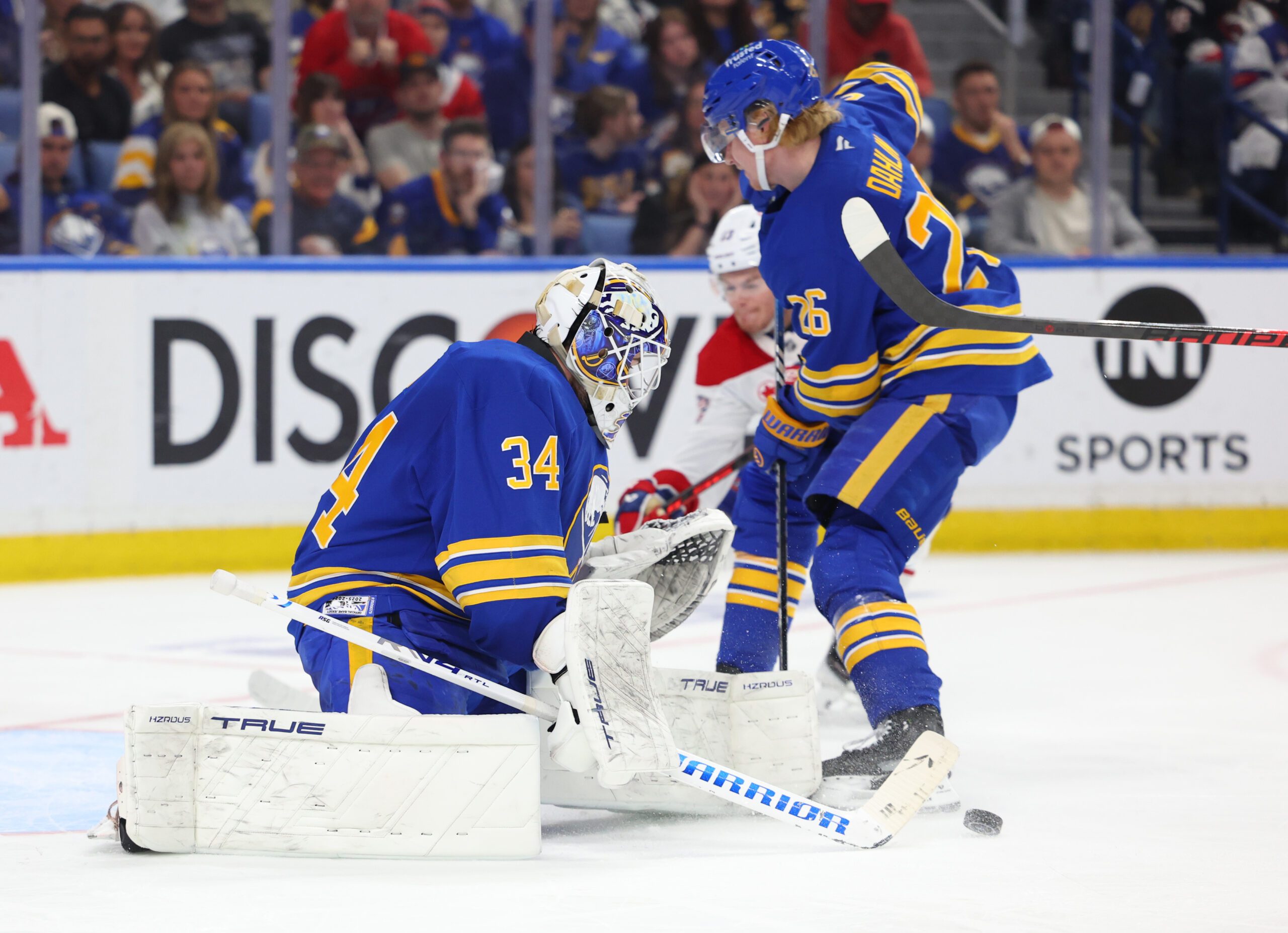 May 8, 2026; Buffalo, New York, USA; Buffalo Sabres goaltender Alex Lyon (34) looks to make a save during the third period against the Montréal Canadiens in game two of the second round of the 2026 Stanley Cup Playoffs at KeyBank Center. Mandatory Credit: Timothy T. Ludwig-Imagn Images