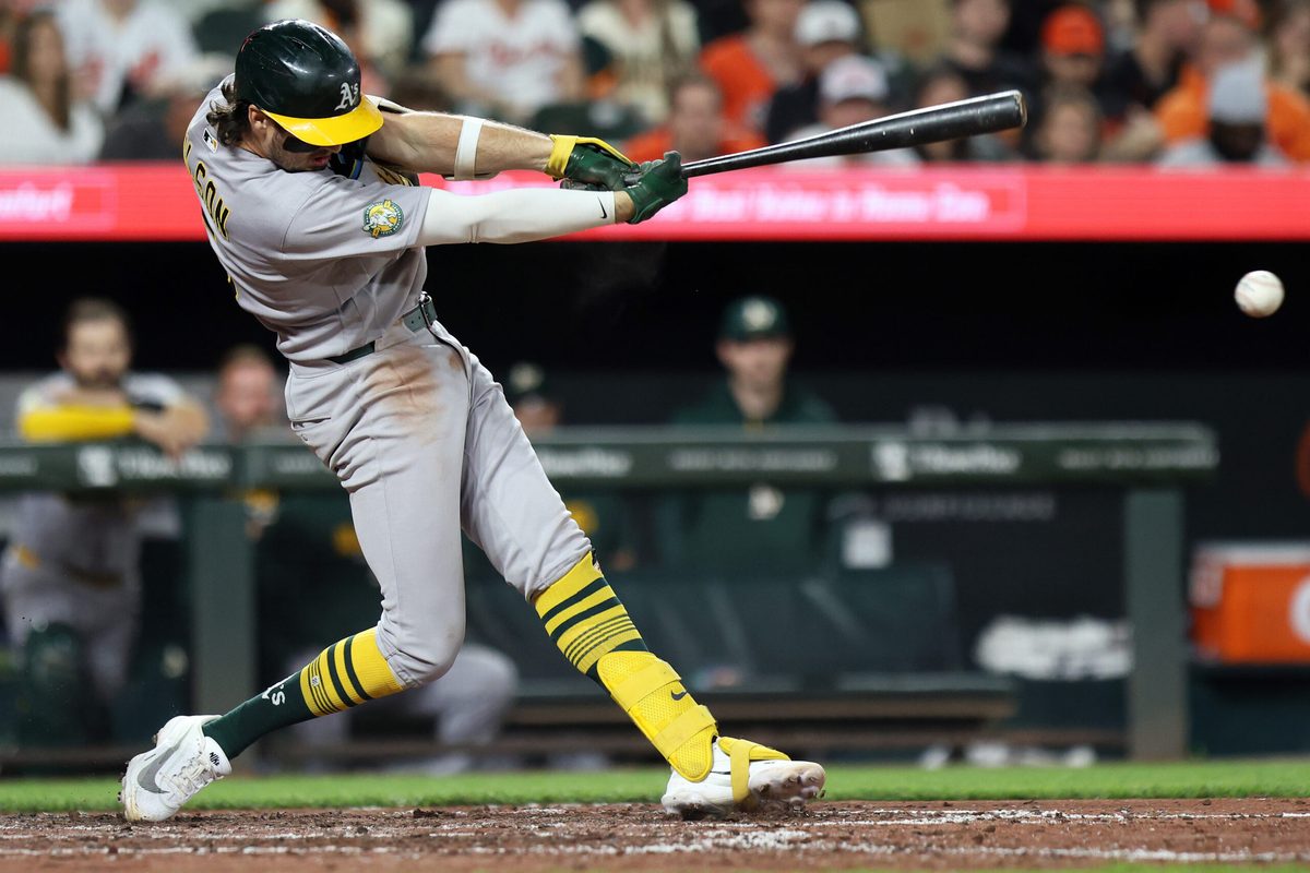 May 8, 2026; Baltimore, Maryland, USA; Athletics shortstop Jacob Wilson (5) hits a RBI single during the eighth inning against the Baltimore Orioles at Oriole Park at Camden Yards. Mandatory Credit: Daniel Kucin Jr.-Imagn Images