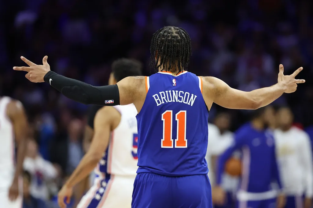 May 8, 2026; Philadelphia, Pennsylvania, USA; New York Knicks guard Jalen Brunson (11) reacts to a Josh Hart (not pictured) three pointer against the Philadelphia 76ers during the third quarter of game three of the second round of the 2026 NBA Playoffs at Xfinity Mobile Arena. Mandatory Credit: Bill Streicher-Imagn Images