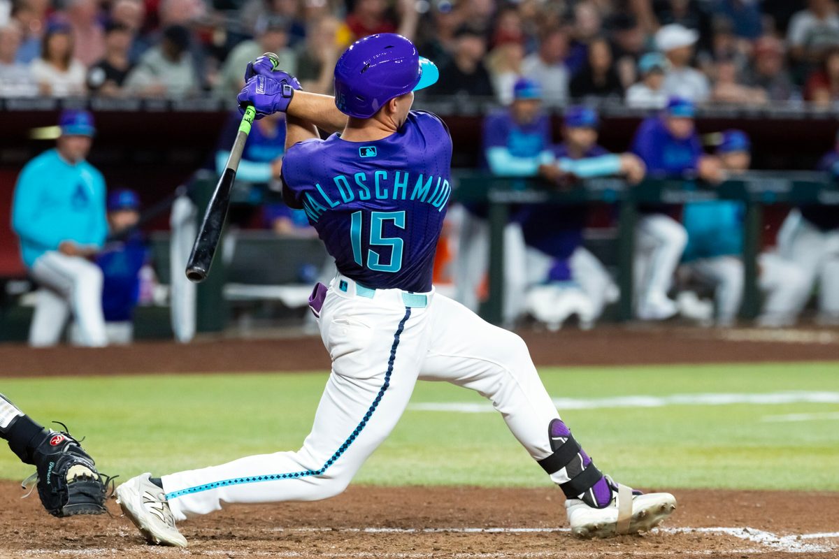 May 8, 2026; Phoenix, Arizona, USA; Arizona Diamondbacks pinch hitter Ryan Waldschmidt hits an eighth inning single for the first hit of his MLB career in the first at bat of his major league career against the New York Mets at Chase Field. Mandatory Credit: Mark J. Rebilas-Imagn Images