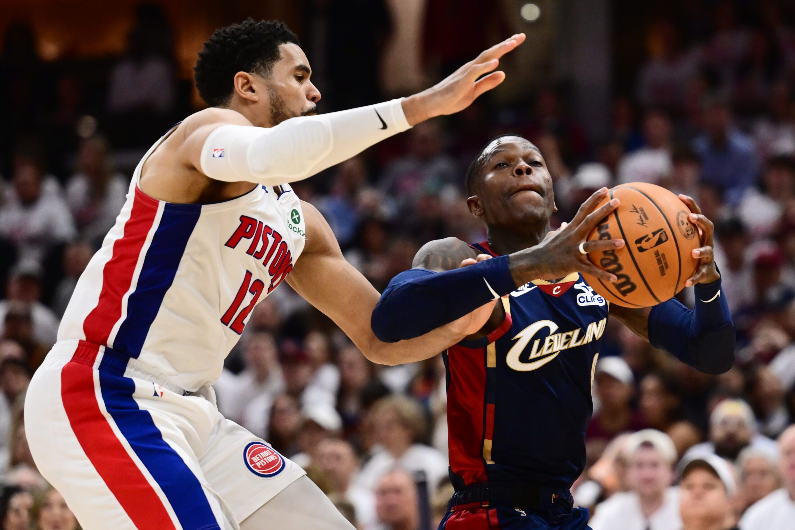 May 9, 2026; Cleveland, Ohio, USA; Cleveland Cavaliers guard Dennis Schroder (8) drives to the basket against Detroit Pistons forward Tobias Harris (12) during the second half of game three in the second round of the 2026 NBA Playoffs at Rocket Arena. Mandatory Credit: Ken Blaze-Imagn Images