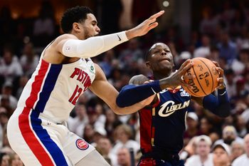 May 9, 2026; Cleveland, Ohio, USA; Cleveland Cavaliers guard Dennis Schroder (8) drives to the basket against Detroit Pistons forward Tobias Harris (12) during the second half of game three in the second round of the 2026 NBA Playoffs at Rocket Arena. Mandatory Credit: Ken Blaze-Imagn Images