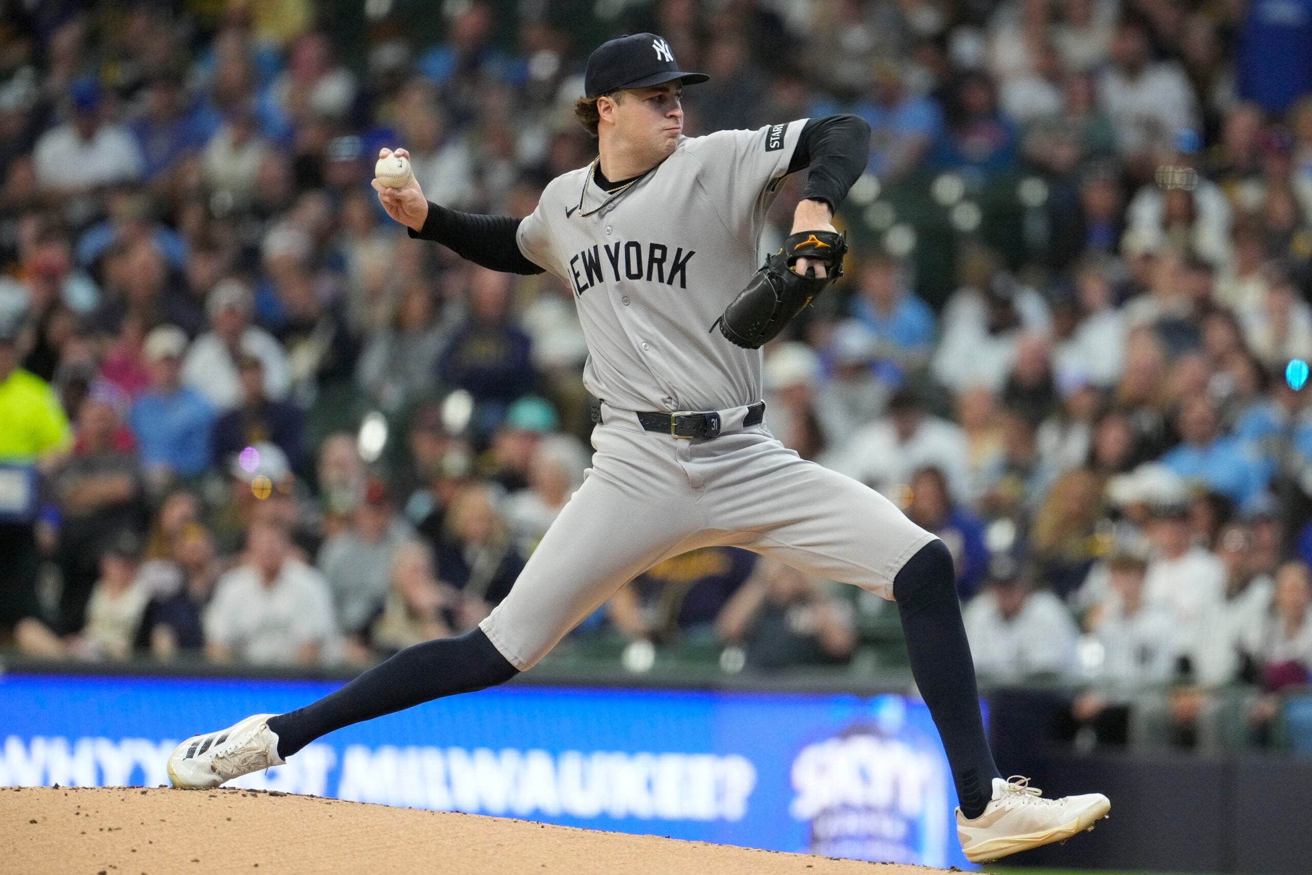 May 9, 2026; Milwaukee, Wisconsin, USA; New York Yankees pitcher Cam Schlittler (31) delivers a pitch against the Milwaukee Brewers in the first inning at American Family Field. Mandatory Credit: Michael McLoone-Imagn Images