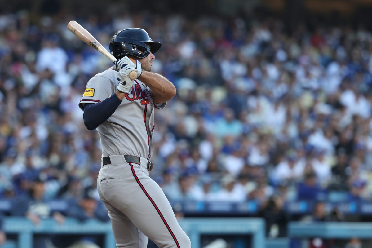 May 9, 2026; Los Angeles, California, USA;  Atlanta Braves first baseman Matt Olson (28) hits an RBI single during the second inning against the Los Angeles Dodgers at Dodger Stadium. Mandatory Credit: Kiyoshi Mio-Imagn Images