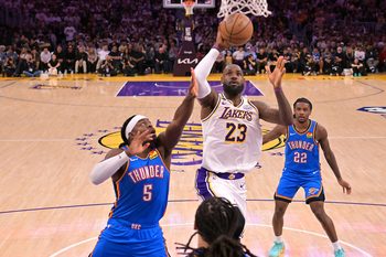 May 9, 2026; Los Angeles, California, USA; Los Angeles Lakers forward LeBron James (23) drives past Oklahoma City Thunder guard Luguentz Dort (5) during game three of the second round of the 2026 NBA Playoffs at Crypto.com Arena. Mandatory Credit: Jayne Kamin-Oncea-Imagn Images