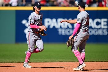 May 10, 2026; Cleveland, Ohio, USA; Minnesota Twins left fielder James Outman (30) is congratulated by Minnesota Twins short stop Brooks Lee (22) after the Twins defeated the Cleveland Guardians at Progressive Field. Mandatory Credit: David Dermer-Imagn Images