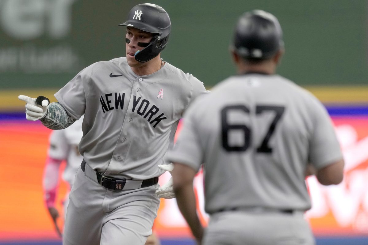 New York Yankees right fielder Aaron Judge (99) rounds third base after hitting a solo home run during the first inning of their game against the Milwaukee Brewers Sunday, May 10, 2026 at American Family Field in Milwaukee, Wisconsin.