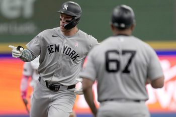 New York Yankees right fielder Aaron Judge (99) rounds third base after hitting a solo home run during the first inning of their game against the Milwaukee Brewers Sunday, May 10, 2026 at American Family Field in Milwaukee, Wisconsin.