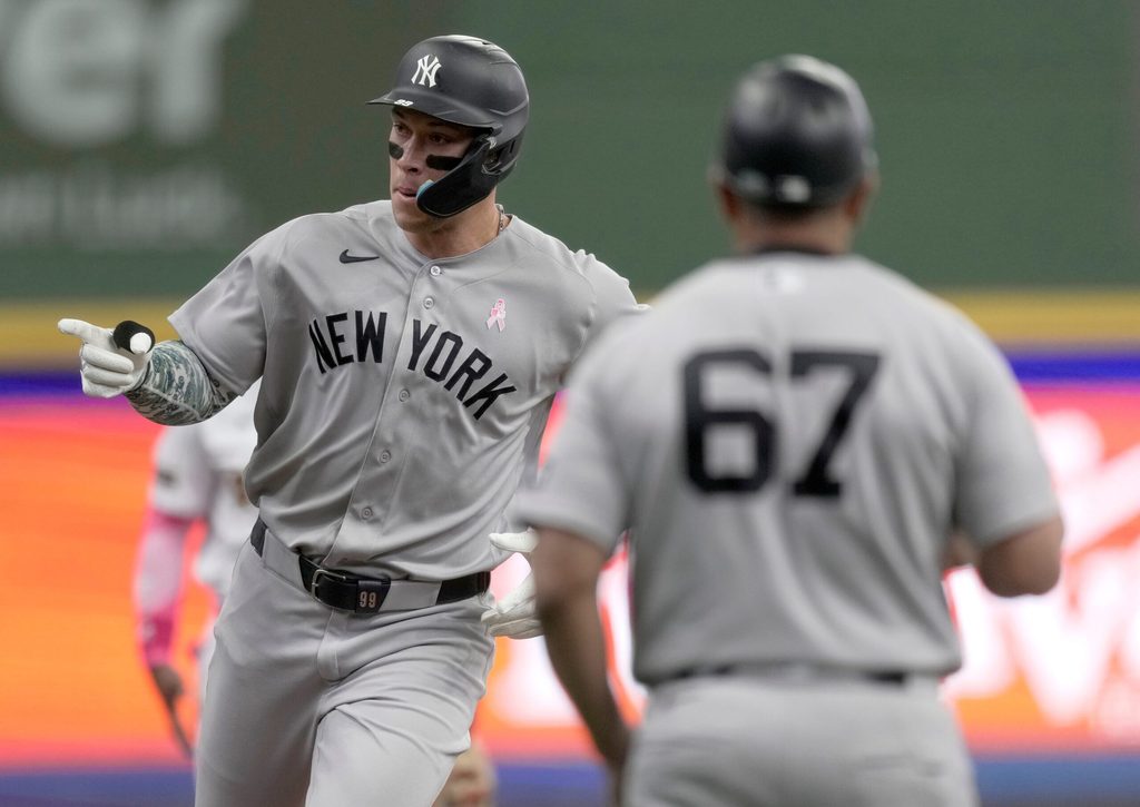New York Yankees right fielder Aaron Judge (99) rounds third base after hitting a solo home run during the first inning of their game against the Milwaukee Brewers Sunday, May 10, 2026 at American Family Field in Milwaukee, Wisconsin.