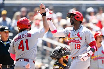 May 10, 2026; San Diego, California, USA; St. Louis Cardinals right fielder Jordan Walker (18) is congratulated by first baseman Alec Burleson (41) after hitting two-run home run during the fourth inning against the San Diego Padres at Petco Park. Mandatory Credit: Denis Poroy-Imagn Images