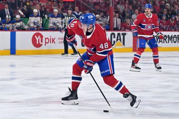 May 10, 2026; Montreal, Quebec, CAN; Montreal Canadiens defenseman Lane Hutson (48) plays the puck against the Buffalo Sabres during the third period in game three of the second round of the 2026 Stanley Cup Playoffs at the Bell Centre. Mandatory Credit: Eric Bolte-Imagn Images