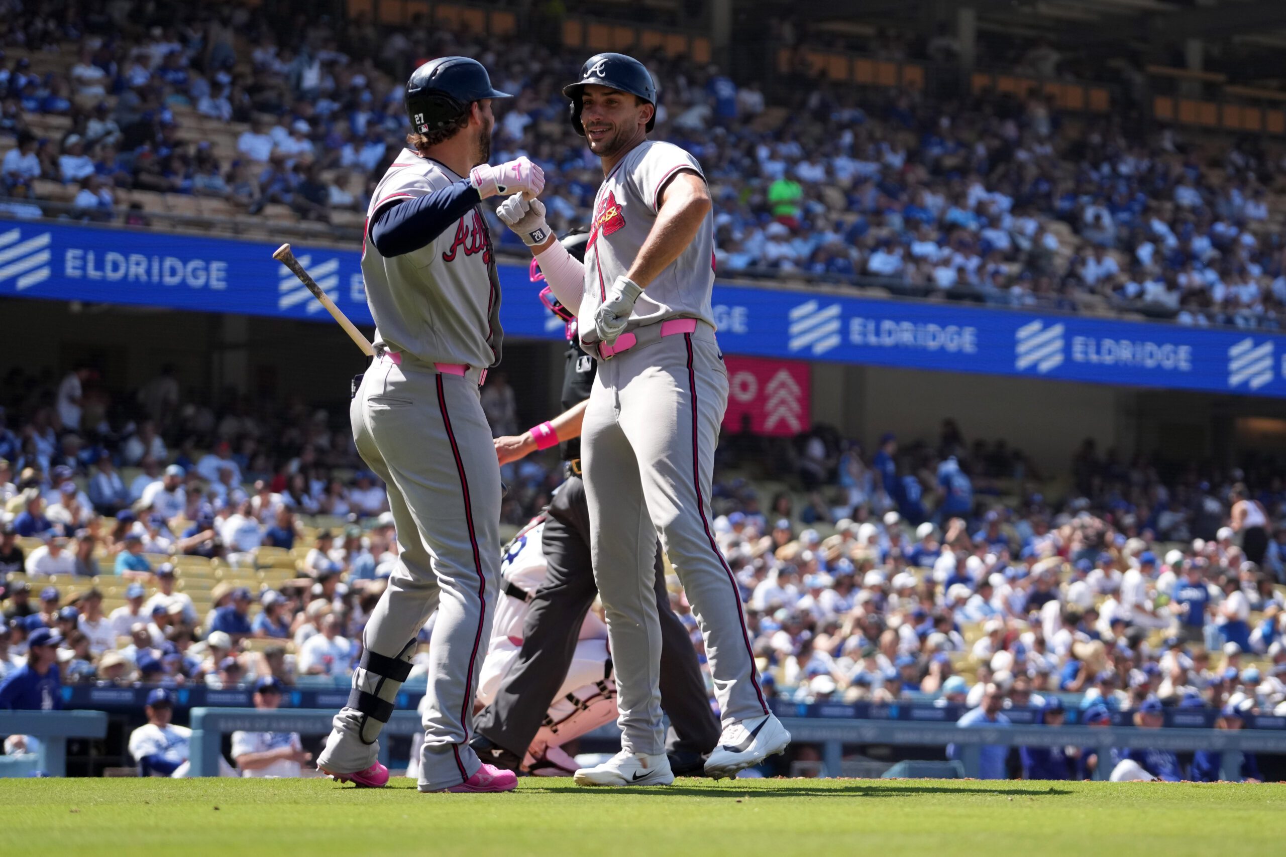 May 10, 2026; Los Angeles, California, USA; Atlanta Braves first baseman Matt Olson (right) celebrates with third baseman Austin Riley (27) after hitting a home run in the ninth inning against the Los Angeles Dodgers at Dodger Stadium. Mandatory Credit: Kirby Lee-Imagn Images