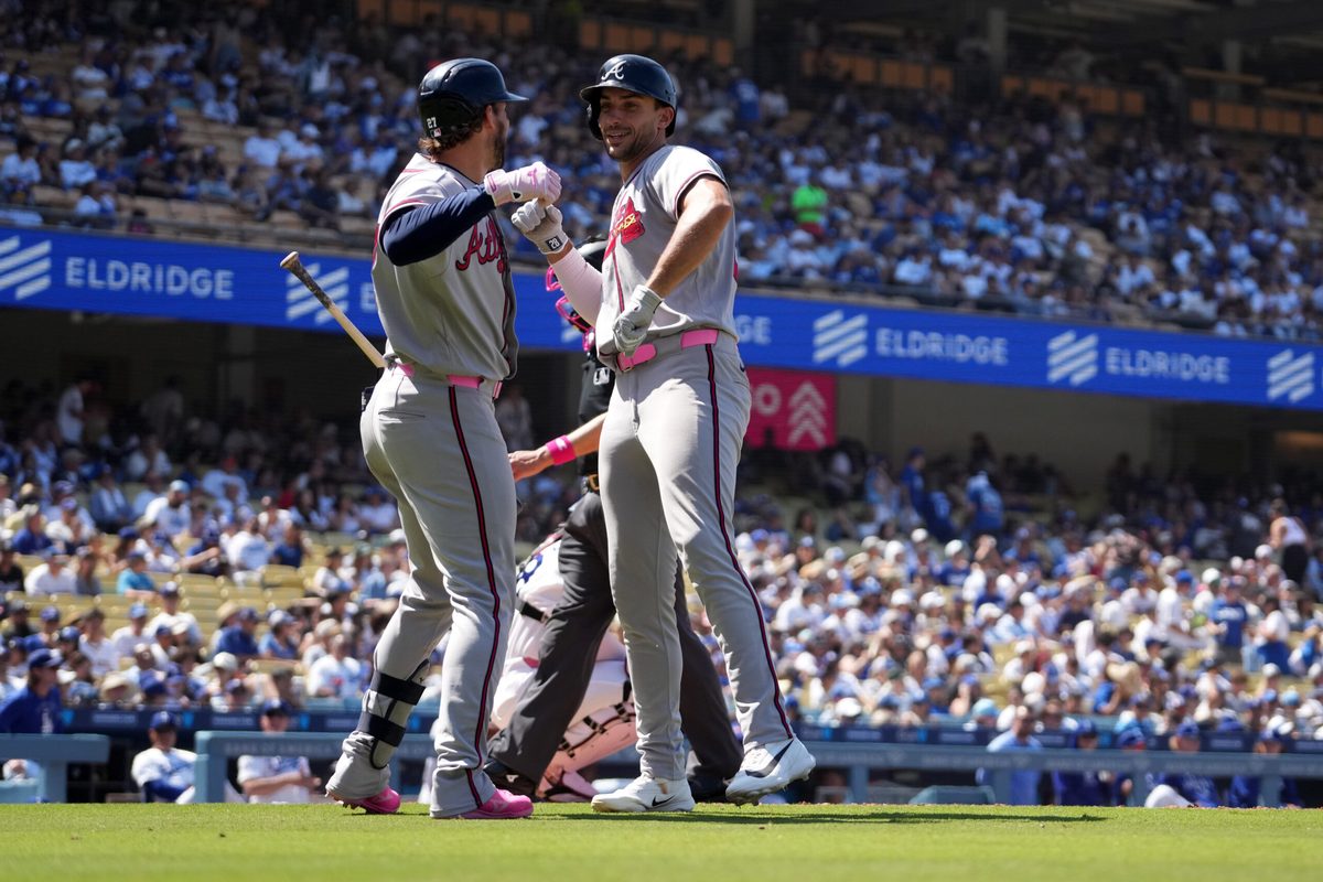 May 10, 2026; Los Angeles, California, USA; Atlanta Braves first baseman Matt Olson (right) celebrates with third baseman Austin Riley (27) after hitting a home run in the ninth inning against the Los Angeles Dodgers at Dodger Stadium. Mandatory Credit: Kirby Lee-Imagn Images