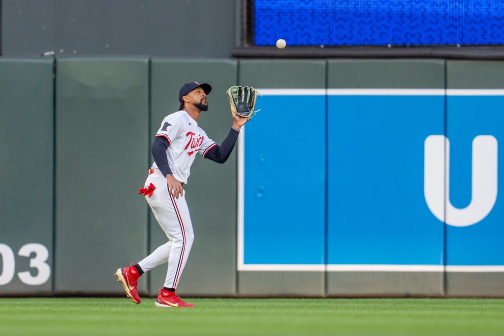 May 12, 2026; Minneapolis, Minnesota, USA; Minnesota Twins center fielder Byron Buxton (25) catches a fly ball against the Miami Marlins in the fourth inning at Target Field. Mandatory Credit: Jesse Johnson-Imagn Images