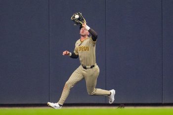 May 12, 2026; Milwaukee, Wisconsin, USA; San Diego Padres center fielder Jackson Merrill (3) catches a fly ball against the Milwaukee Brewers in the fourth inning at American Family Field. Mandatory Credit: Michael McLoone-Imagn Images