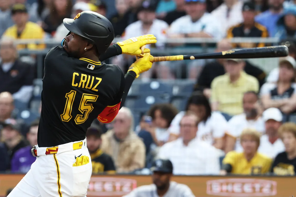 May 12, 2026; Pittsburgh, Pennsylvania, USA; Pittsburgh Pirates center fielder Oneil Cruz (15) hits a double against the Colorado Rockies during the fifth inning at PNC Park. Mandatory Credit: Charles LeClaire-Imagn Images