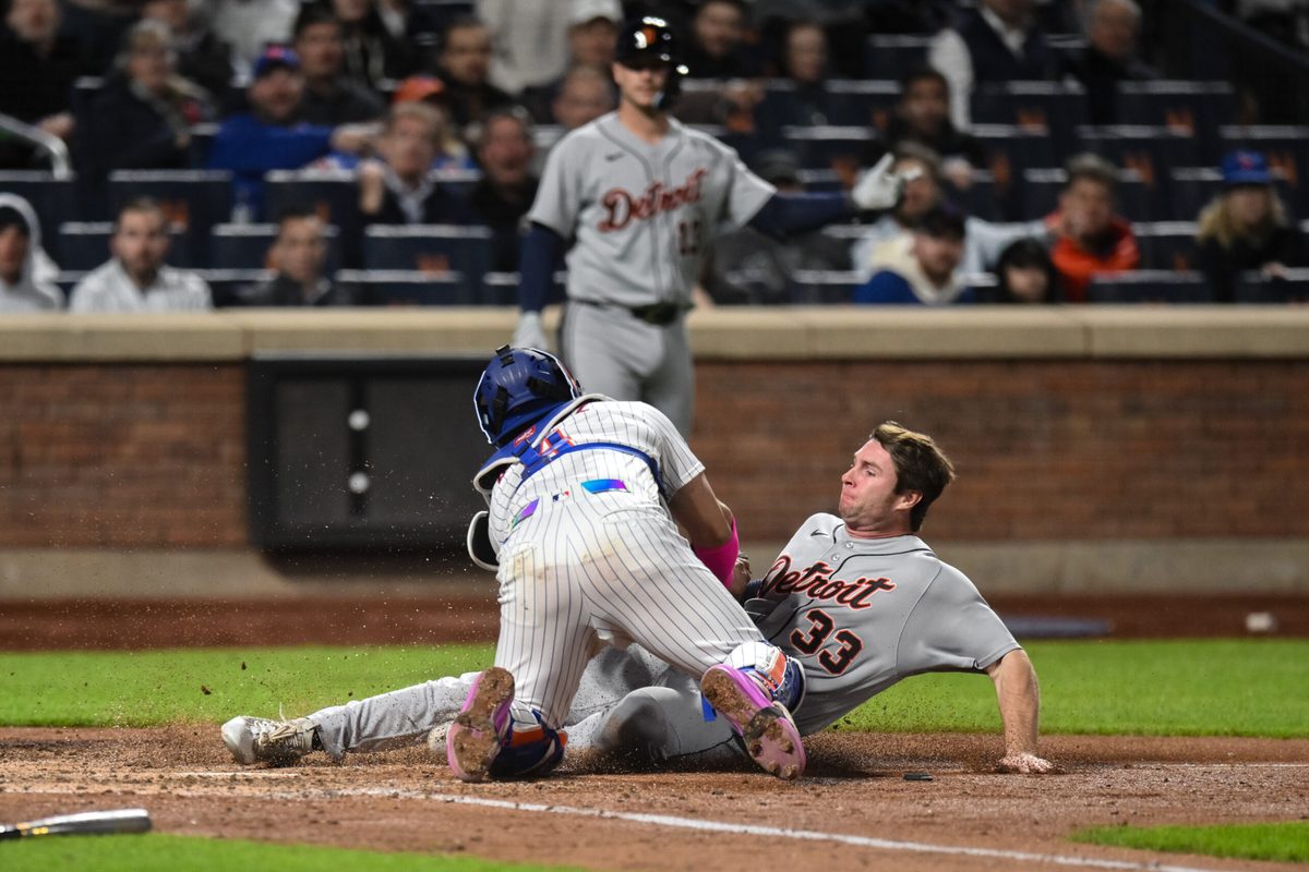 May 12, 2026; New York City, New York, USA; Detroit Tigers third baseman Colt Keith (33) is tagged out by New York Mets catcher Francisco Alvarez (4) while trying to score a run during the fifth inning at Citi Field. Mandatory Credit: John Jones-Imagn Images