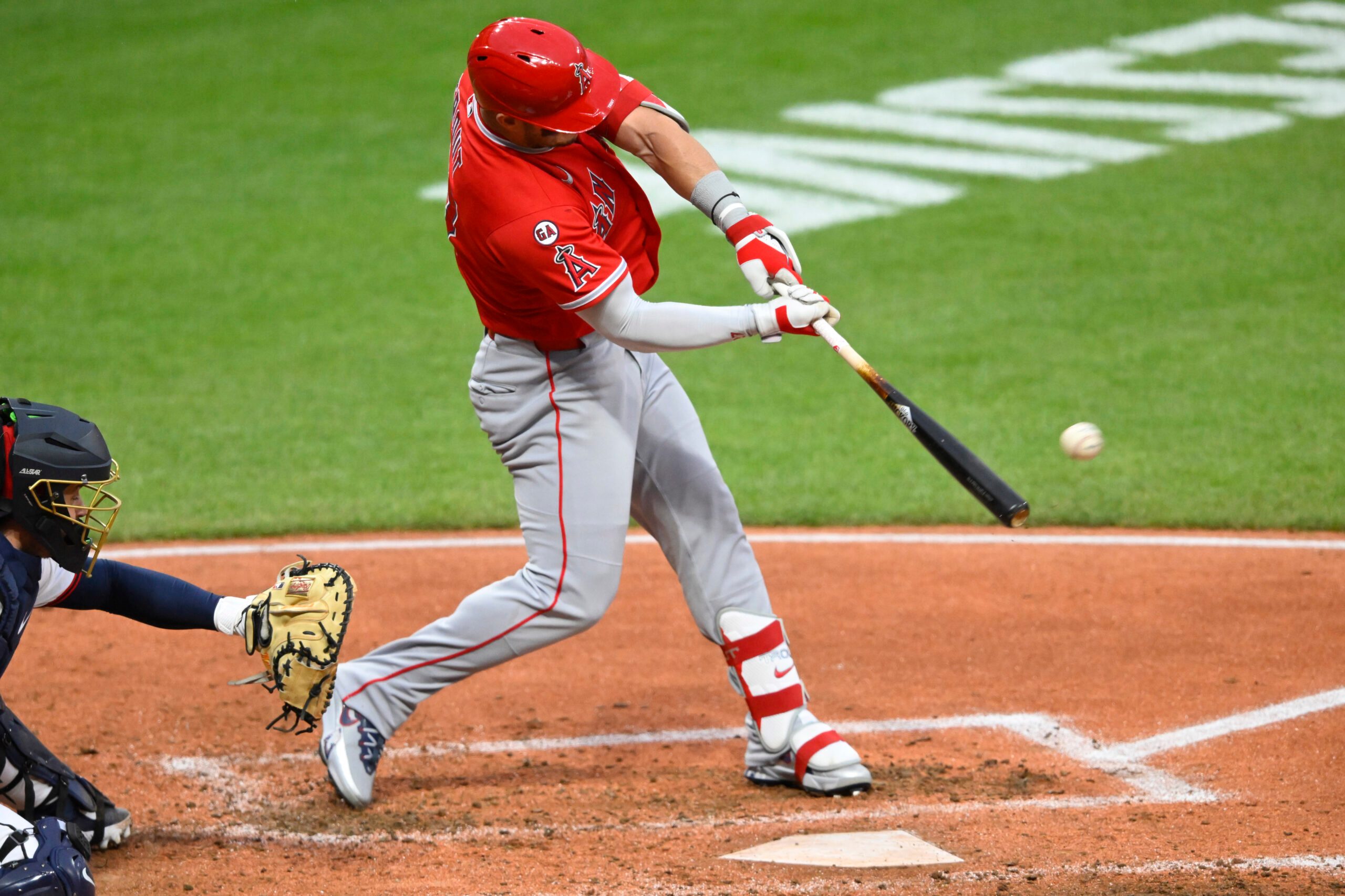 May 12, 2026; Cleveland, Ohio, USA; Los Angeles Angels center fielder Mike Trout (27) doubles in the fifth inning against the Cleveland Guardians at Progressive Field. Mandatory Credit: David Richard-Imagn Images