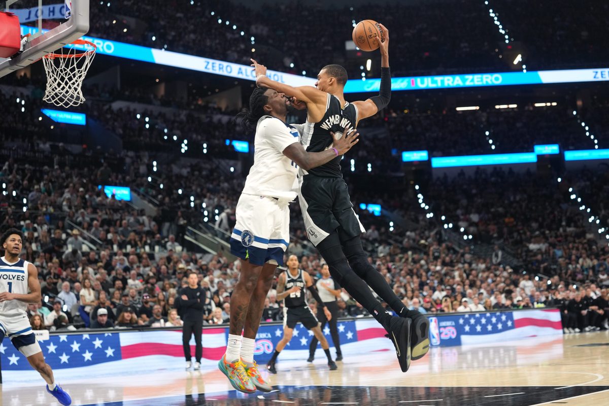 May 12, 2026; San Antonio, Texas, USA; San Antonio Spurs forward Victor Wembanyama (1) drives to the basket against Minnesota Timberwolves center Naz Reid (11) during the second half of game five of the second round of the 2026 NBA Playoffs at Frost Bank Center. Mandatory Credit: Scott Wachter-Imagn Images